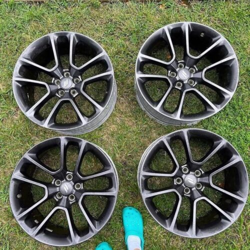 OEM rims off a 2021 Dodge Charger ScatPack.