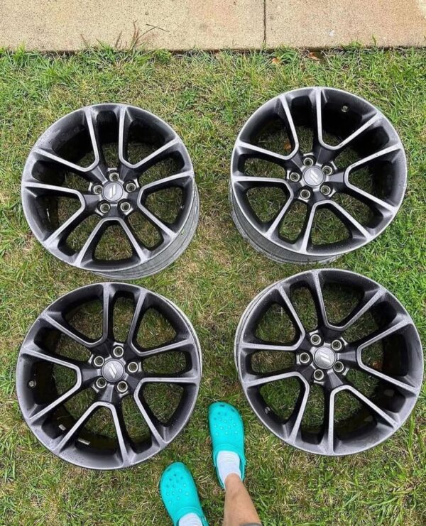 OEM rims off a 2021 Dodge Charger ScatPack.